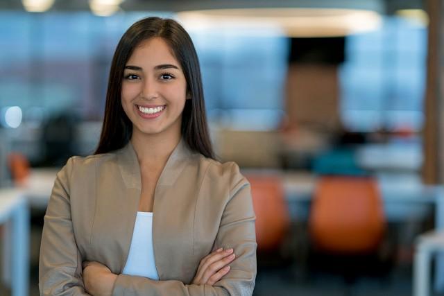 Female graduate student posing for photograph.